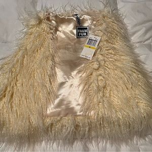 Cream colored faux fur vest